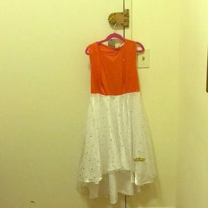 Red and white sparkly dress.